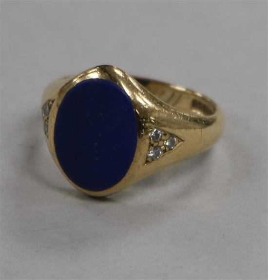 A 1980s 9ct gold, lapis lazuli and diamond set signet ring, size R.